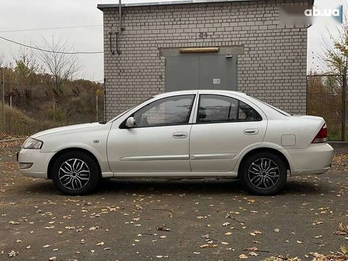 Nissan Almera 2011 - фото 9