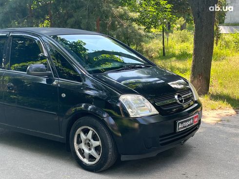 Opel Meriva 2005 черный - фото 9