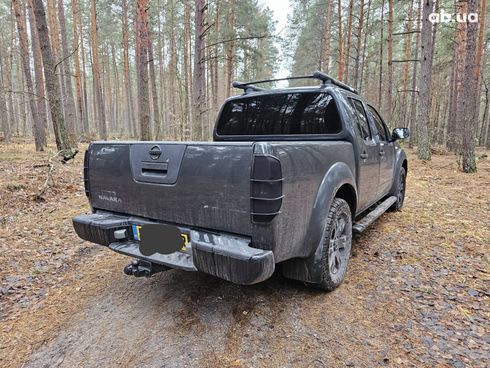 Nissan Navara 2006 черный - фото 3