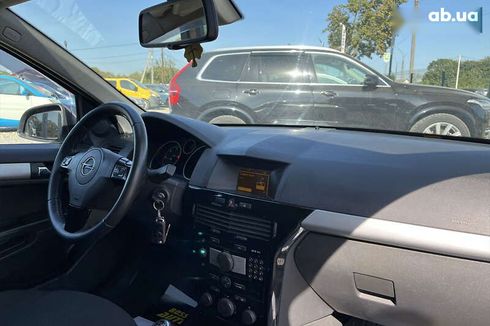 Opel Astra 2010 - фото 26