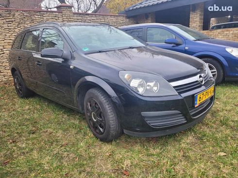 Opel Astra 2006 черный - фото 1