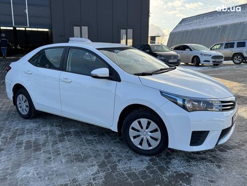 Toyota Corolla 2014 белый - фото 4