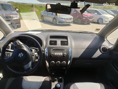 Suzuki SX4 2008 зеленый - фото 30