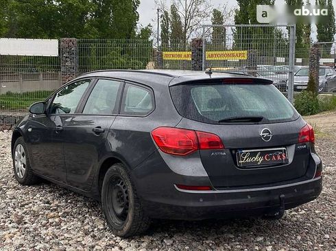 Opel Astra 2011 - фото 7