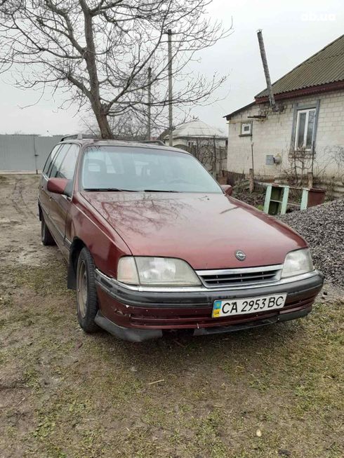Opel Omega 1991 вишневый - фото 1