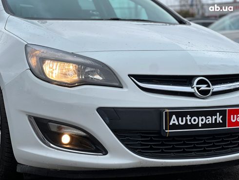 Opel Astra 2013 белый - фото 4