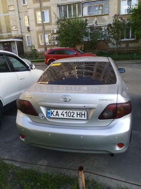 Toyota Corolla 2007 серебристый - фото 8