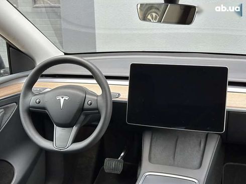 Tesla Model Y 2024 - фото 18