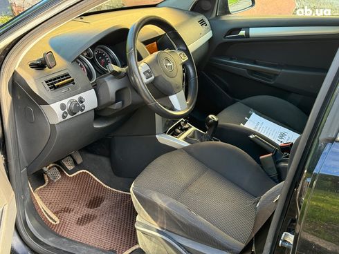 Opel Astra 2009 черный - фото 17