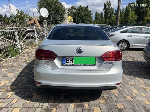 Volkswagen Jetta 2014 серебристый - фото 19