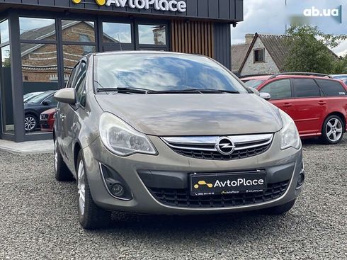 Opel Corsa 2011 - фото 6