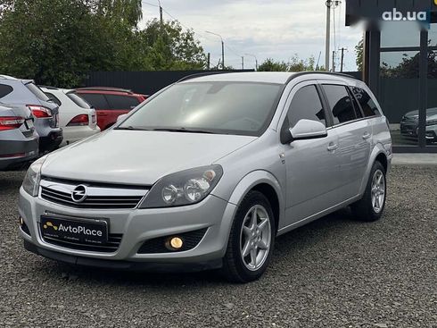 Opel Astra 2010 - фото 16
