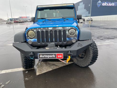 Jeep Wrangler 2014 синий - фото 2