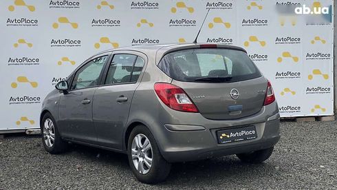 Opel Corsa 2011 - фото 27