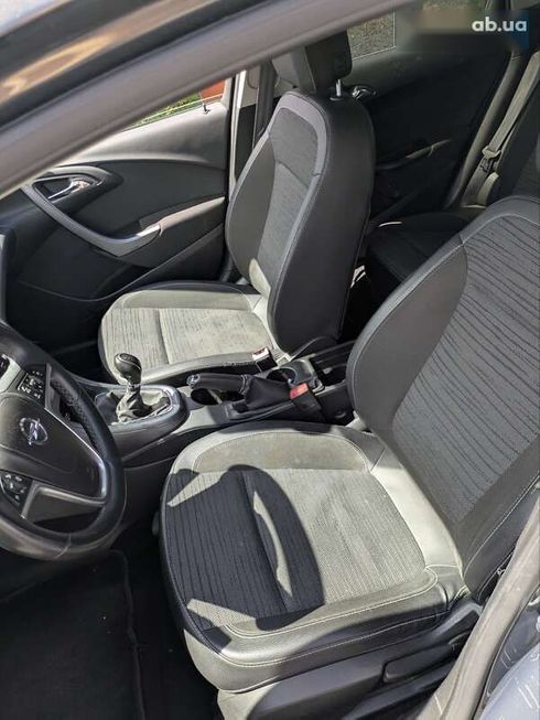 Opel Astra 2014 - фото 11