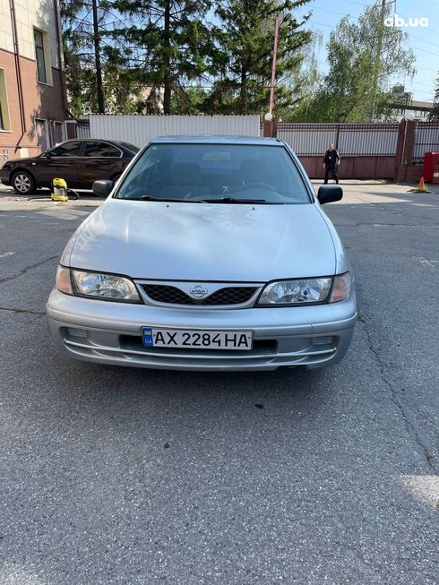 Nissan Almera 1998 серебристый - фото 7