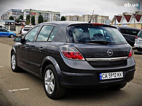 Opel Astra 2009 - фото 4