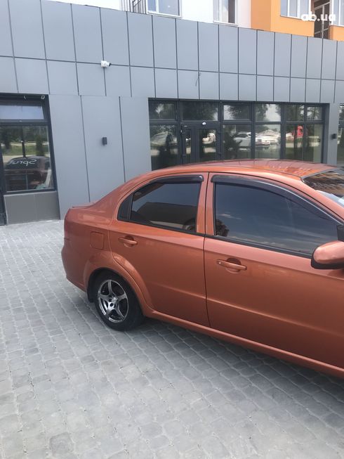 Chevrolet Aveo 2008 оранжевый - фото 3