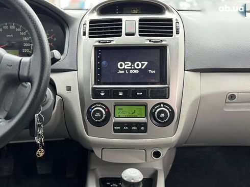 Kia Cerato 2006 - фото 15