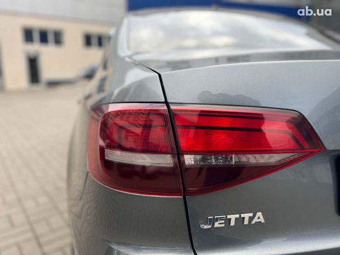 Volkswagen Jetta 2016 серый - фото 11