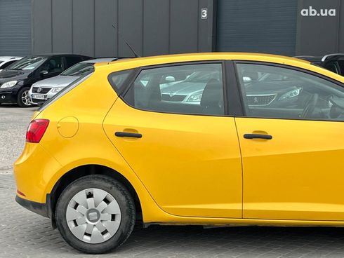 SEAT Ibiza 2011 желтый - фото 6