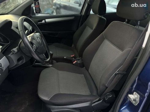 Opel Astra 2010 - фото 25