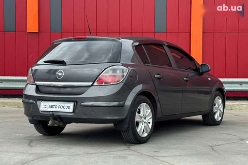 Opel Astra 2010 - фото 8