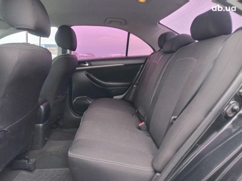 Toyota Avensis 2008 черный - фото 16
