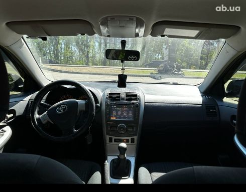 Toyota Corolla 2008 черный - фото 15
