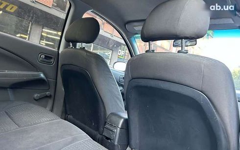 Nissan Almera 2009 - фото 14