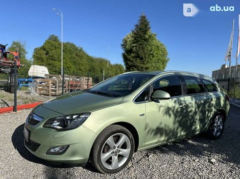 Opel Astra 2011 - фото 9