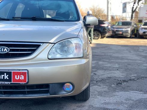 Kia Carens 2003 бежевый - фото 9