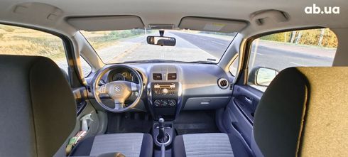 Suzuki SX4 2011 серебристый - фото 11