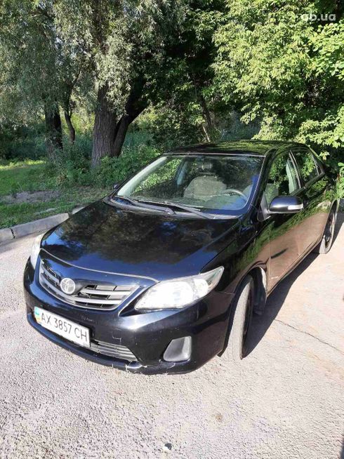 Toyota Corolla 2010 черный - фото 2