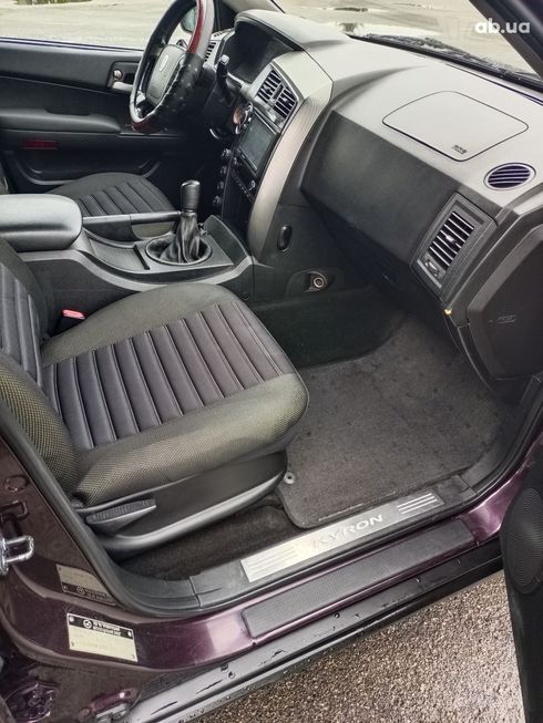 SsangYong Kyron 2010 вишневый - фото 10