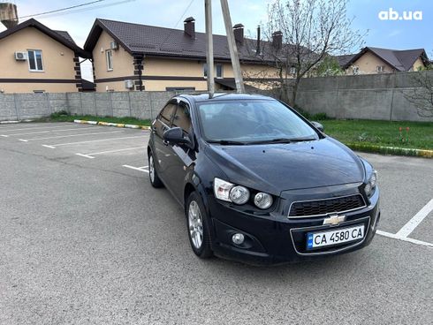 Chevrolet Aveo 2013 черный - фото 5