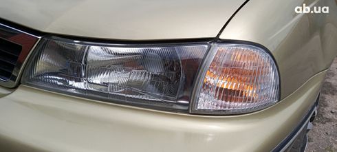 Daewoo Nexia 2008 золотистый - фото 13
