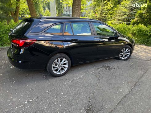 Opel Astra 2022 черный - фото 5