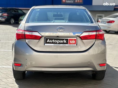 Toyota Corolla 2013 коричневый - фото 6
