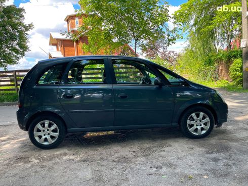 Opel Meriva 2009 синий - фото 7
