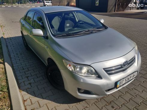 Toyota Corolla 2008 серебристый - фото 9