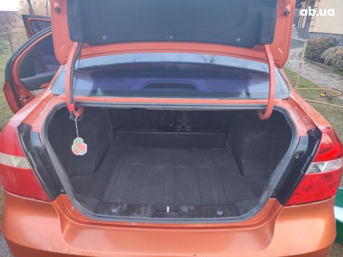 Chevrolet Aveo 2008 оранжевый - фото 6