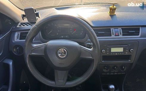 Skoda Rapid 2014 - фото 10