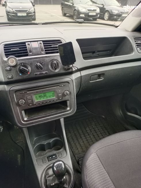 Skoda Fabia 2014 зеленый - фото 6