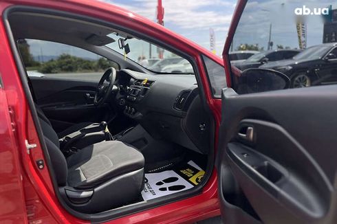 Kia Rio 2011 - фото 9