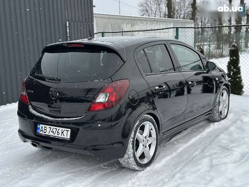 Opel Corsa 2010 - фото 12
