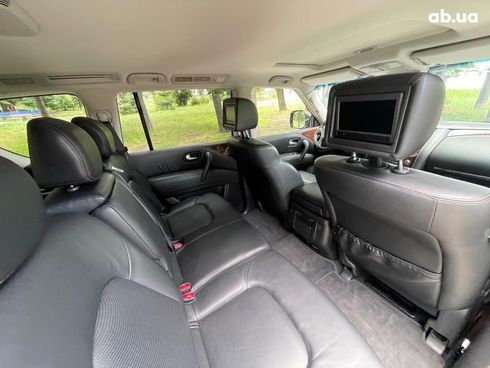 Nissan Patrol 2013 белый - фото 47