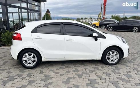 Kia Rio 2013 - фото 8