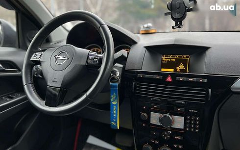 Opel Astra 2010 - фото 21