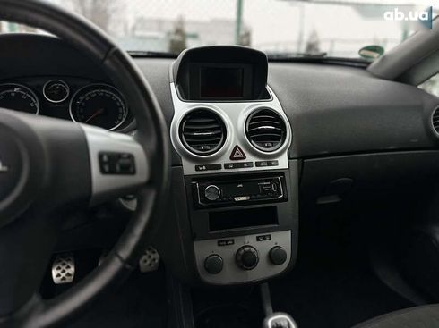 Opel Corsa 2010 - фото 28